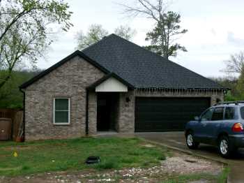Closer view of the residence before removal.