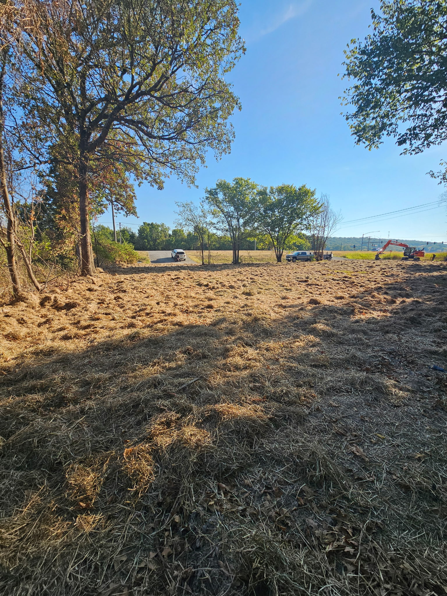 Shared completion view of the adjacent Robinson Avenue demolition project area in Springdale, Arkansas.
